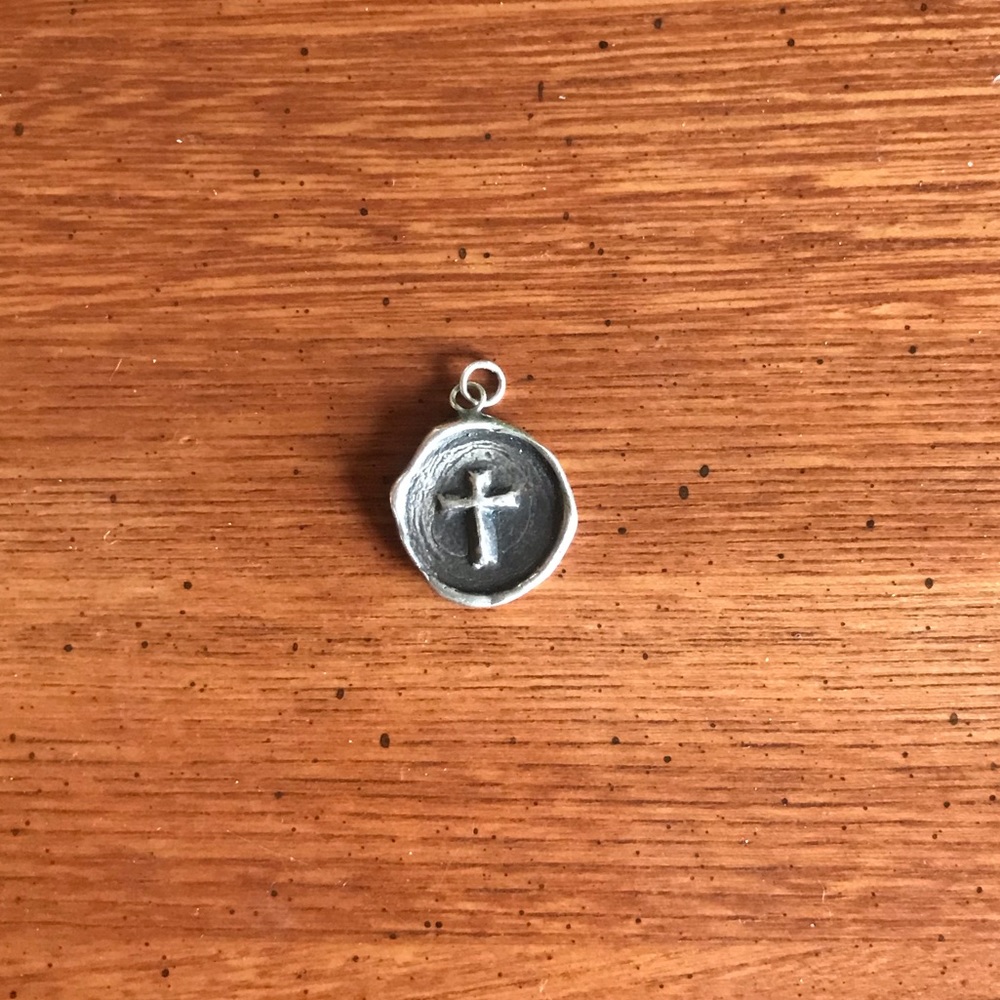 Pyrrha Cross necklace.